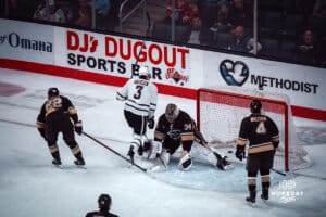 UNO Mavericks player, Sam Stange, scores a goal during a college hockey game on Dec 29, 2024 in Omaha, Nebraska. Photo by Logan Hock