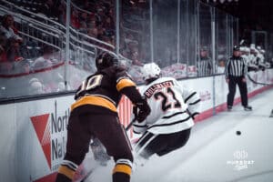 UNO Mavericks player, Tyler Rollwagen, races toward a puck during a college hockey game on Dec 29, 2024 in Omaha, Nebraska. Photo by Logan Hock