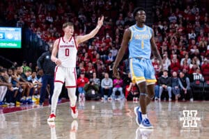 Nebraska Cornhuskers guard Connor Essegian (0) celebrates a three-point shot against the Southern University Jaguars in the second half during college basketball game, Monday, December 30, 2024, in Lincoln, Nebraska. Photo by John S. Peterson.