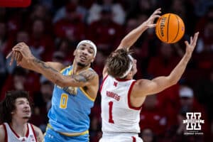 Nebraska Cornhuskers guard Sam Hoiberg (1) reaches for the rebound against Southern University Jaguars center Brentay Noel (0) in the first half during college basketball game, Monday, December 30, 2024, in Lincoln, Nebraska. Photo by John S. Peterson.