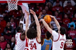 Nebraska Cornhuskers forward Berke Buyuktuncel (9) blocks a shot from Southern University Jaguars center Dionjahe Thomas (8) in the first half during college basketball game, Monday, December 30, 2024, in Lincoln, Nebraska. Photo by John S. Peterson.