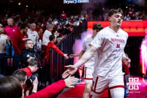 Nebraska Cornhuskers guard Connor Essegian (0) runs out onto the court to take on Southern University Jaguars during college basketball game, Monday, December 30, 2024, in Lincoln, Nebraska. Photo by John S. Peterson.