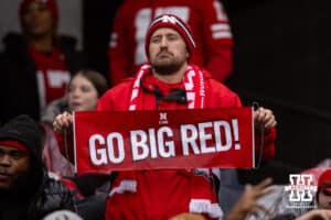 Nebraska Cornhuskers fan holding a "Go Big Red" sign during the Pinstripe Bowl game against the Boston College Eagles, Saturday, December 28, 2024, in New York, New York. Photo by John S. Peterson.