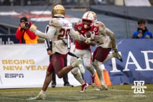 Nebraska Cornhuskers running back Emmett Johnson (21) makes catch for a touchdown against the Boston College Eagles during the Pinstripe Bowl game, Saturday, December 28, 2024, in New York, New York. Photo by John S. Peterson.