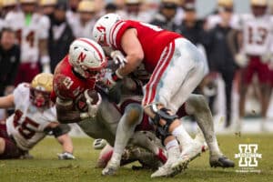 Nebraska Cornhuskers running back Emmett Johnson (21) runs with the ball against the Boston College Eagles during the Pinstripe Bowl game, Saturday, December 28, 2024, in New York, New York. Photo by John S. Peterson.