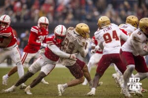 Nebraska Cornhuskers defensive lineman Elijah Jeudy (16) tackles Boston College Eagles defensive back Cameron Martinez (29) during the Pinstripe Bowl game, Saturday, December 28, 2024, in New York, New York. Photo by John S. Peterson.