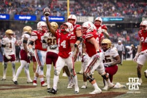 Nebraska Cornhuskers running back Rahmir Johnson (14) celebrates a touchdown against Boston College Eagles defensive lineman Kwan Williams (55) during the Pinstripe Bowl game, Saturday, December 28, 2024, in New York, New York. Photo by John S. Peterson.