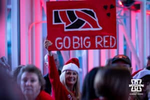 Nebraska Cornhuskers fan holding a sign a the Husker get together at the Galt House during the semi-final round in the NCAA championship Thursday, December 19, 2024, in Louisville, Kentucky. Photo by John S. Peterson.