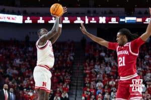 Nebraska Cornhuskers forward Juwan Gary (4) maks a three point shot against Indiana Hoosiers forward Mackenzie Mgbako (21) in the second half during a college basketball game Friday, December 13, 2024 in Lincoln, Nebraska. Photo by Jaelle Johnson.