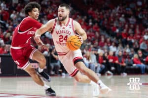 Nebraska Cornhuskers guard Rollie Worster (24) drives to the basket against Indiana Hoosiers guard Myles Rice (1) in the first half during a college basketball game Friday, December 13, 2024 in Lincoln, Nebraska. Photo by Jaelle Johnson.