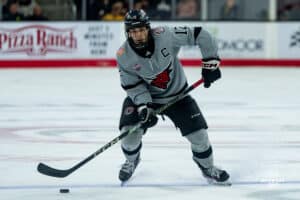 Captain defenseman, Nolan Krenzen, during a hockey match at Baxter Arena on Saturday, December 14, 2024, in Omaha, Nebraska. Photo by Collin Stilen.