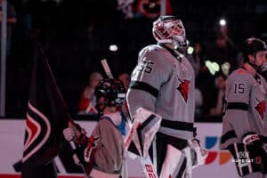 Goalkeeper Kevin Reidler ready for the match at lineups during a hockey match at Baxter Arena on Saturday, December 14, 2024, in Omaha, Nebraska. Photo by Collin Stilen.