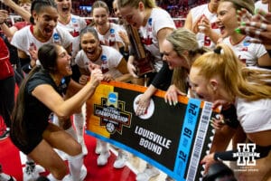 Nebraska Cornhuskers libero Lexi Rodriguez (8) punched the ticket to go to Louisville for the final four after the win over the Wisconsin Badgers during the second regional match in the NCAA championship Sunday, December 15, 2024, in Lincoln, Nebraska. Photo by John S. Peterson.