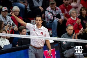 Nebraska Cornhuskers assistant Jaylen Reyes celebrates a point against the Dayton Flyers in the second set during the first regional match in the NCAA championship Friday, December 13, 2024, in Lincoln, Nebraska. Photo by John S. Peterson.