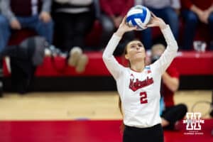 Nebraska Cornhuskers setter Bergen Reilly (2) sets the ball against the Dayton Flyers in the first set during the first regional match in the NCAA championship Friday, December 13, 2024, in Lincoln, Nebraska. Photo by John S. Peterson.