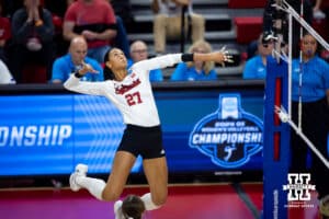 Nebraska Cornhuskers outside hitter Harper Murray (27) prepares to spike the ball against the Dayton Flyers in the first set during the first regional match in the NCAA championship Friday, December 13, 2024, in Lincoln, Nebraska. Photo by John S. Peterson.