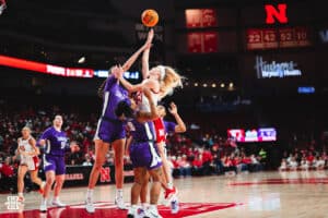 Britt Prince (23) attempts to shoot a ball while being blocked by Miannah Little (10) during a college basketball game Wednesday, December 11, 2024, in Lincoln, Nebraska. Photo by Charlotte A. Gottfried.