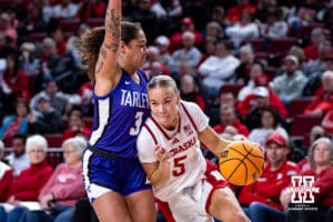 Nebraska Cornhuskers Alberte Rimdal (5) drives to the basket against Tarleton State Texans Niki Van Wyk (3) in the second half during a women’s college basketball game Wednesday, December 11, 2024, in Lincoln, Nebraska. Photo by John S. Peterson.