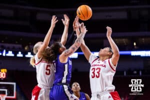 Nebraska Cornhuskers Alberte Rimdal (5) and Amiah Hargrove (33) go fro the rebound against Tarleton State Texans Niki Van Wyk (3) in the second half during a women’s college basketball game Wednesday, December 11, 2024, in Lincoln, Nebraska. Photo by John S. Peterson.