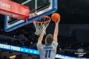 Creighton Bluejays Ryan Kalkbrenner dunks during a college basketball game against the UNLV Rebels on December 7th, 2024 in Omaha Nebraska. Photo by Brandon Tiedemann.