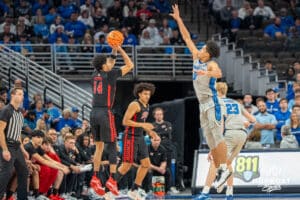 Creighton Bluejays Jasen Green contests a shot during a college basketball game against the UNLV Rebels on December 7th, 2024 in Omaha Nebraska. Photo by Brandon Tiedemann.