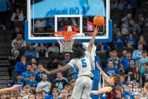 Creighton Bluejays Jamiya Neal blocks a shot during a college basketball game against the UNLV Rebels on December 7th, 2024 in Omaha Nebraska. Photo by Brandon Tiedemann.