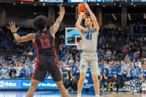 Creighton Bluejays Isaac Traudt shoots a three during a college basketball game against the UNLV Rebels on December 7th, 2024 in Omaha Nebraska. Photo by Brandon Tiedemann.