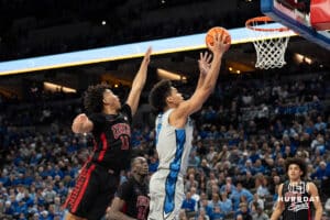 Creighton Bluejays Jasen Green shoots a layup during a college basketball game against the UNLV Rebels on December 7th, 2024 in Omaha Nebraska. Photo by Brandon Tiedemann.