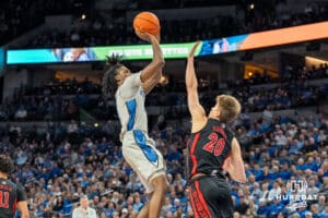 Creighton Bluejays Jamiya Neal attempts a jumpshot during a college basketball game against the UNLV Rebels on December 7th, 2024 in Omaha Nebraska. Photo by Brandon Tiedemann.