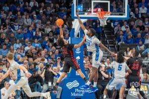 Creighton Bluejays Fredrick King blocks a shot during a college basketball game against the UNLV Rebels on December 7th, 2024 in Omaha Nebraska. Photo by Brandon Tiedemann.