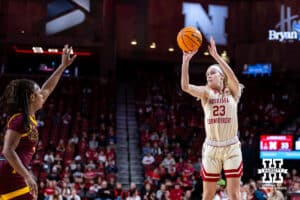 Nebraska Cornhuskers guard Britt Prince (23) makes a three point shot against the Minnesota Golden Gophers in the first half during a college basketball game Sunday, December 8, 2024, in Lincoln, Nebraska. Photo by John S. Peterson.