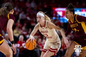 Nebraska Cornhuskers guard Britt Prince (23) dribbles the ball against the Minnesota Golden Gophers in the first half during a college basketball game Sunday, December 8, 2024, in Lincoln, Nebraska. Photo by John S. Peterson.