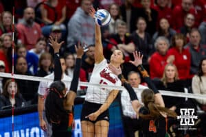Nebraska Cornhuskers outside hitter Merritt Beason (13) spikes the ball against the Miami Hurricanes during the second round of the NCAA volleyball tournament Saturday, December 7, 2024, in Lincoln, Nebraska. Photo by John S. Peterson.