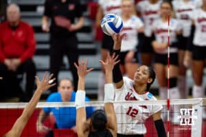 Nebraska Cornhuskers outside hitter Taylor Landfair (12) spikes the ball against the Miami Hurricanes during the second round of the NCAA volleyball tournament Saturday, December 7, 2024, in Lincoln, Nebraska. Photo by John S. Peterson.