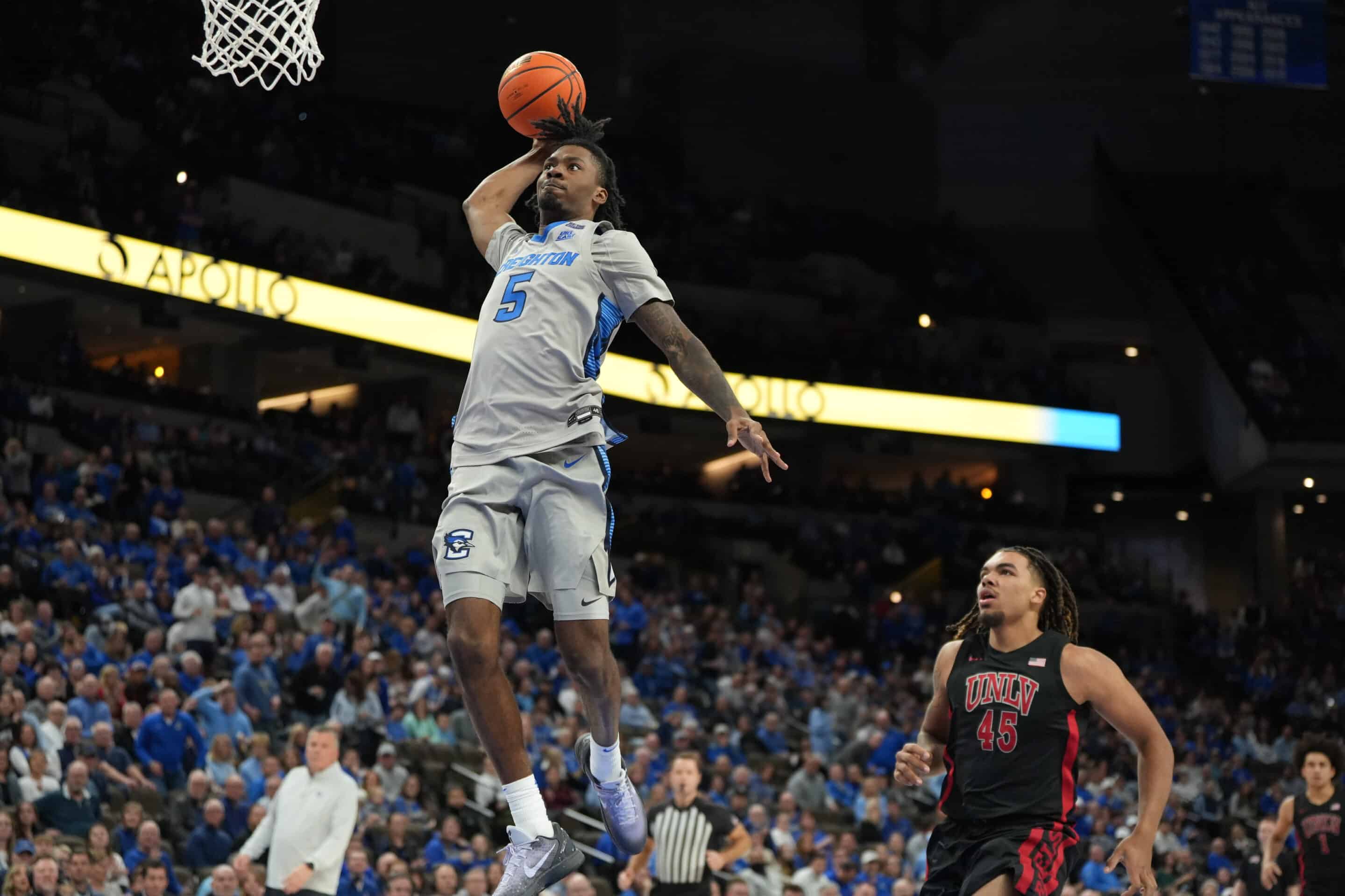 DSC09313 Creighton guard Jamiya Neal elevates for a dunk against UNLV. Photo by Brandon Tiedemann.