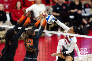 Nebraska Cornhuskers outside hitter Harper Murray (27) spikes the ball past Florida A&M Rattlers in the second set during the first round of the NCAA volleyball tournament Friday, December 6, 2024, in Lincoln, Nebraska. Photo by John S. Peterson.