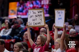 Nebraska Cornhuskers fans holding signs against the Florida A&M Rattlers during the first round of the NCAA volleyball tournament Friday, December 6, 2024, in Lincoln, Nebraska. Photo by John S. Peterson.