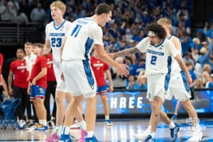Creighton Bluejays celebrates against the Kansas Jayhawk during a college basketball game on Wednesday, December 4th, 2024, in Omaha Nebraska. Photo by Brandon Tiedemann.