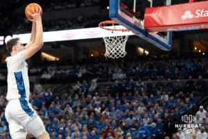 Creighton Bluejays Ryan Kalkbrenner dunks against the Kansas Jayhawks during a college basketball game on Wednesday, December 4th, 2024 in Omaha Nebraska. Photo by Brandon Tiedemann.