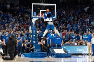 Creighton Bluejays mascot Billy makes a dunk at halftime against the Kansas Jayhawks during a college basketball game on Wednesday, December 4th, 2024, in Omaha Nebraska. Photo by Brandon Tiedemann.