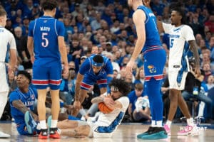 Creighton Bluejays Pop Isaacs retrives a loose ball during a college basketball game on December 4th, 2024 in Omaha Nebraska. Photo by Brandon Tiedemann.
