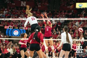 Nebraska Cornhusker middle blocker Andi Jackson (15) spikes the ball celebrates a point against the Indiana Hoosiers during a college volleyball game on Nov 16, 2024 in Lincoln, Nebraska. Photo by Logan Hock