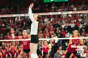 Nebraska Cornhusker setter Bergen Reilly (2) sets the ball celebrates a point against the Indiana Hoosiers during a college volleyball game on Nov 16, 2024 in Lincoln, Nebraska. Photo by Logan Hock