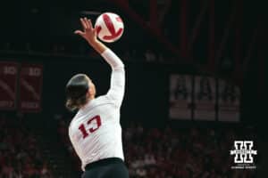 Nebraska Cornhusker outside hitter Merritt Beason (13) serves the ball celebrates a point against the Indiana Hoosiers during a college volleyball game on Nov 16, 2024 in Lincoln, Nebraska. Photo by Logan Hock