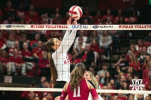 Nebraska Cornhusker setter Bergen Reilly (2) sets the ball against the Indiana Hoosiers during a college volleyball game on Nov 16, 2024 in Lincoln, Nebraska. Photo by Logan Hock