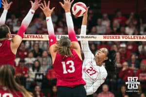 Nebraska Cornhusker outside hitter Harper Murray (27) spikes the ball against the Indiana Hoosiers during a college volleyball game on Nov 16, 2024 in Lincoln, Nebraska. Photo by Logan Hock