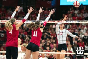 Nebraska Cornhusker outside hitter Merritt Beason (13) spikes the ball against the Indiana Hoosiers during a college volleyball game on Nov 16, 2024 in Lincoln, Nebraska. Photo by Logan Hock