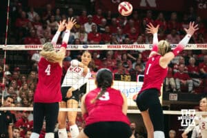 Nebraska Cornhusker outside hitter Merritt Beason (13) spikes the ball against the Indiana Hoosiers during a college volleyball game on Nov 16, 2024 in Lincoln, Nebraska. Photo by Logan Hock