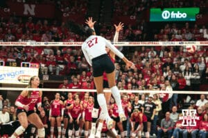 Nebraska Cornhusker outside hitter Harper Murray (27) spikes the ball against the Indiana Hoosiers during a college volleyball game on Nov 16, 2024 in Lincoln, Nebraska. Photo by Logan Hock