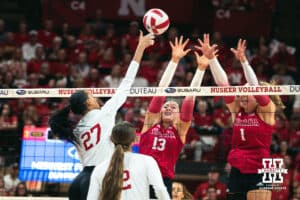 Nebraska Cornhusker outside hitter Harper Murray (27) spikes the ball against the Indiana Hoosiers during a college volleyball game on Nov 16, 2024 in Lincoln, Nebraska. Photo by Logan Hock